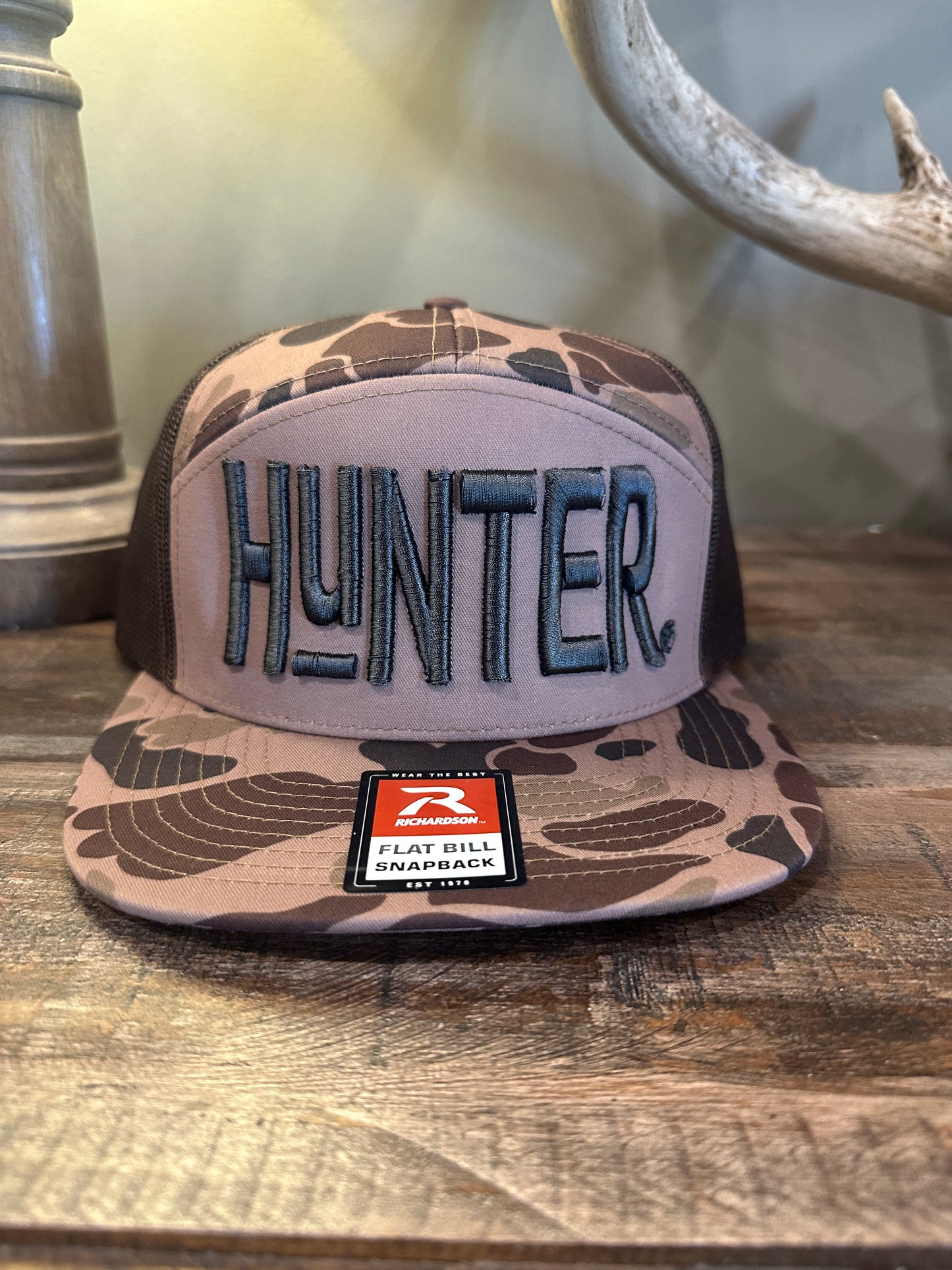 HUNTER® 7panel Flat Bill Tall Letter Dark Camo Hat